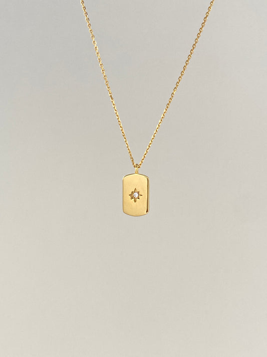 14k gold star set diamond small dog tag necklace